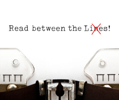 Read Between The Lies Concept On Typewriter