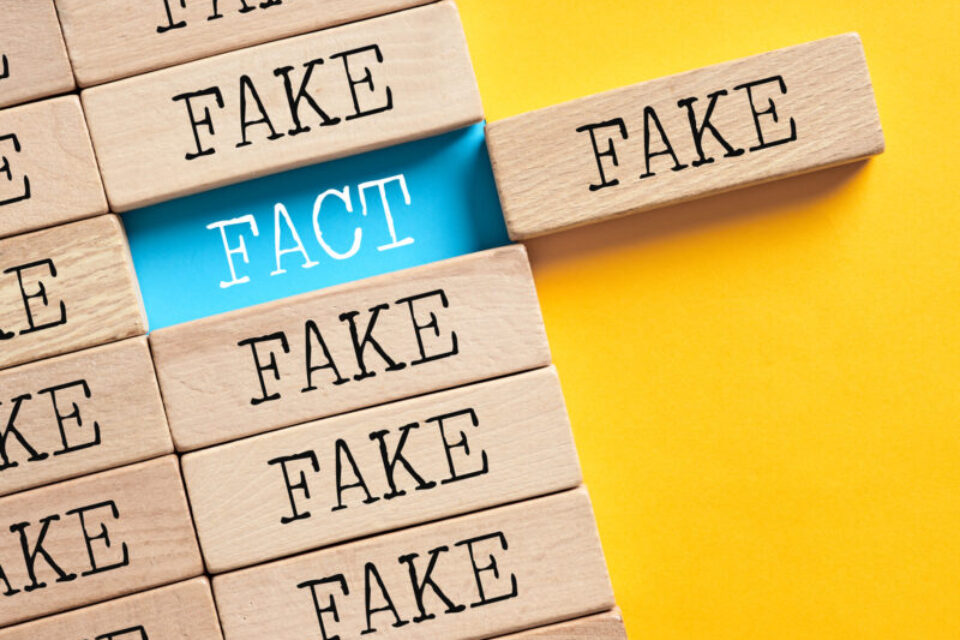 Fake or fact concept. To reveal or discover the fact hidden under the fake.