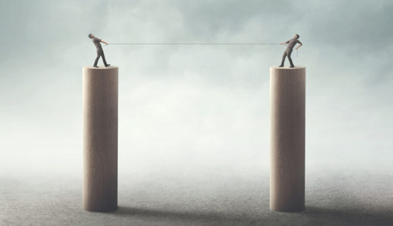 businessmen fight concept tug of war
