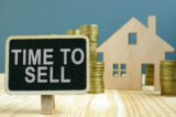 Model of house with money. Time to sell concept. Model of house with money. Time to sell concept.